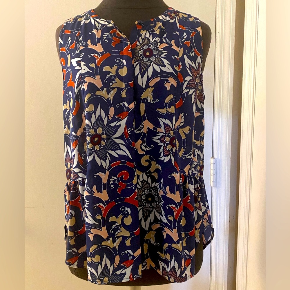 Loft floral pattern sleeveless button up top. Navy/rust/mustard/white. Size M